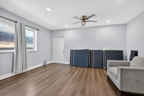 a view of a livingroom with a staircase