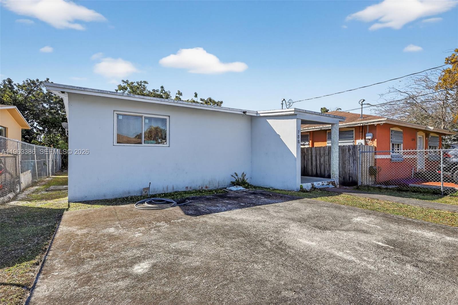 1880 Northwest 69th Street Miami, FL 33147 - Photo 16 of 19 a backyard of a house