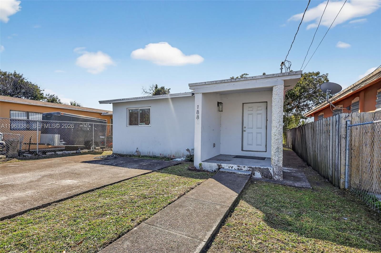 1880 Northwest 69th Street Miami, FL 33147 - Photo 2 of 19 a view of a backyard of a house