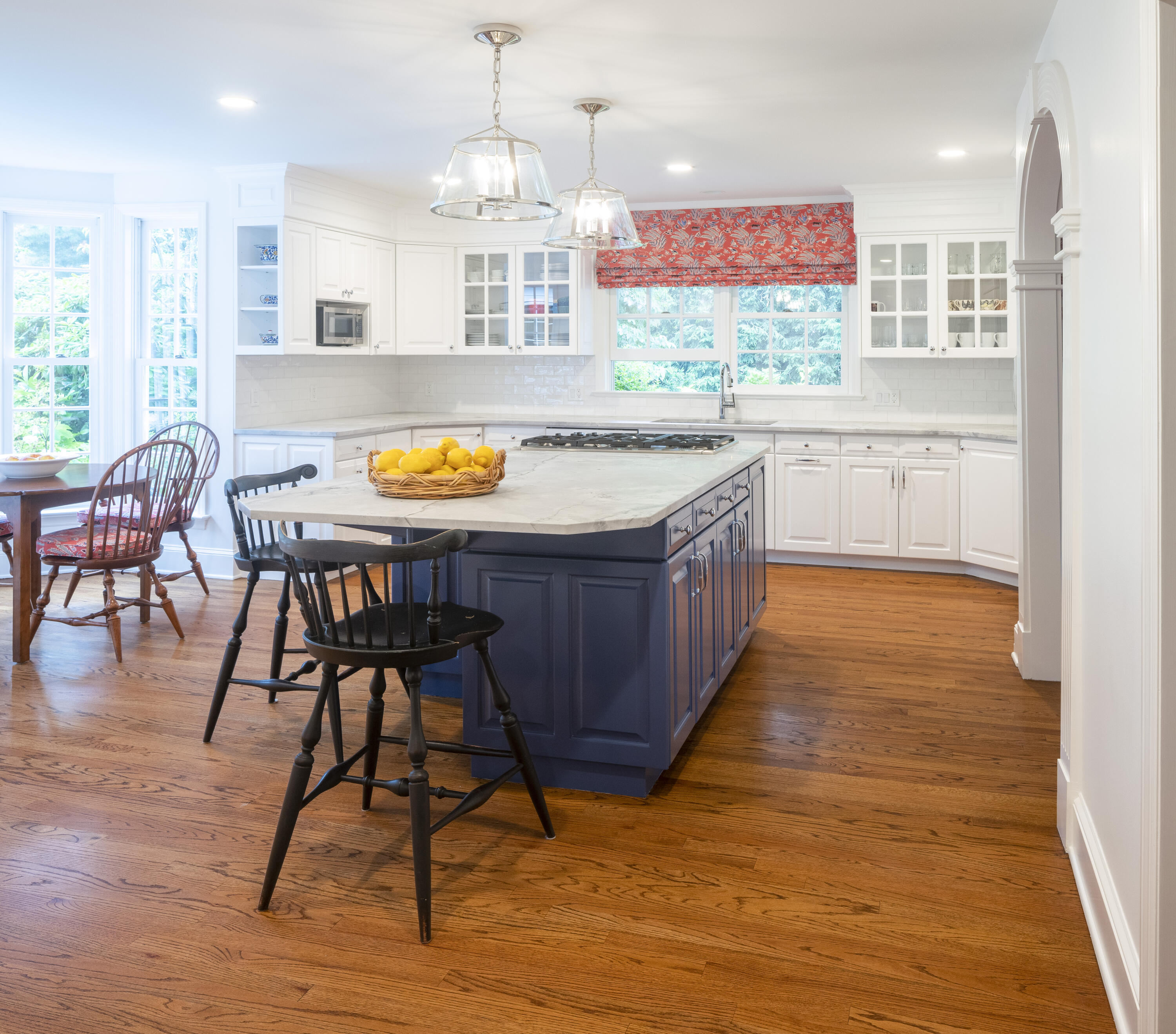 35 Rosebrook Road New Canaan, CT 06840 - Photo 12 of 38 a kitchen with stainless steel appliances granite countertop wooden floors and a view of living room