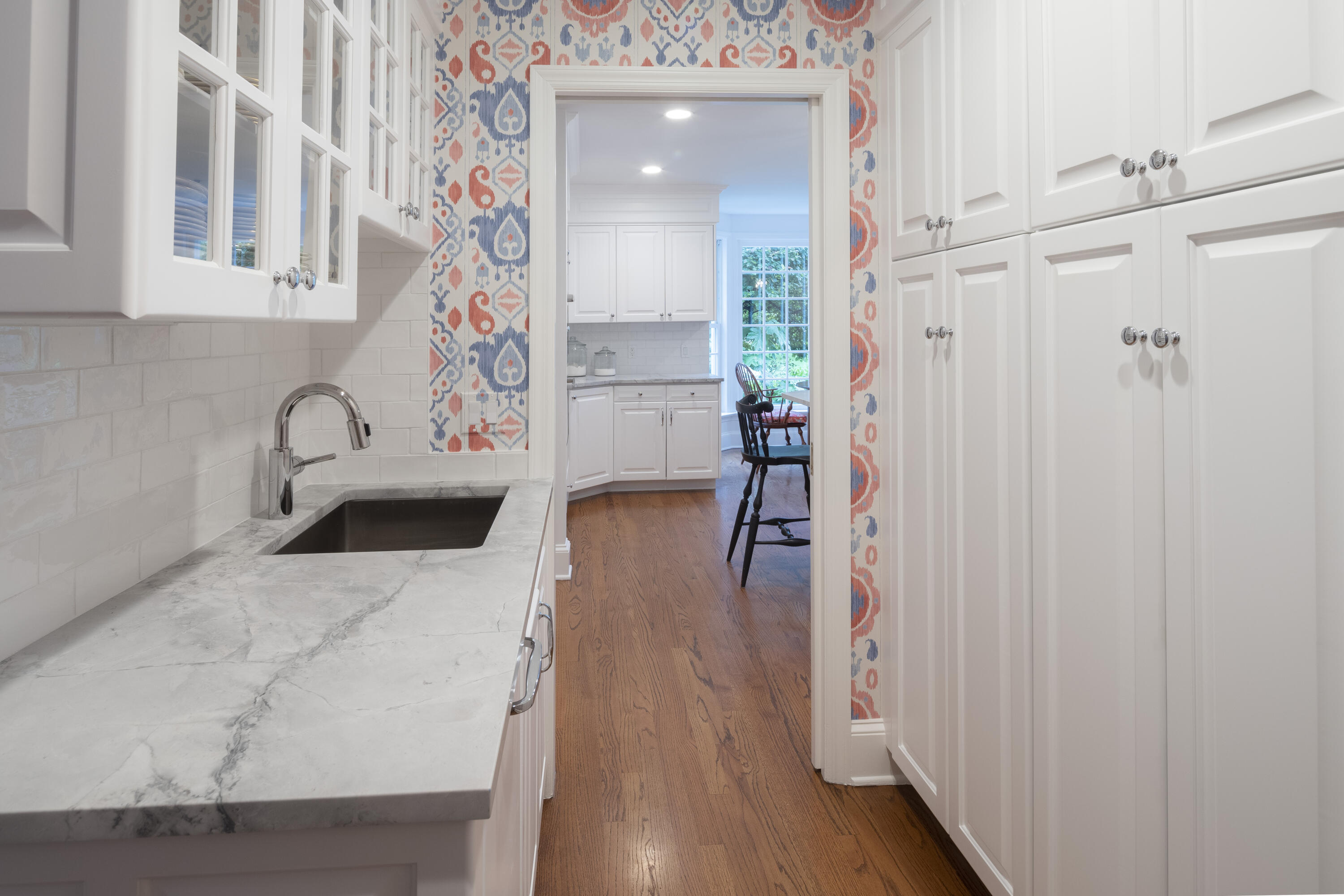35 Rosebrook Road New Canaan, CT 06840 - Photo 13 of 38 a kitchen with granite countertop a sink and wooden floor