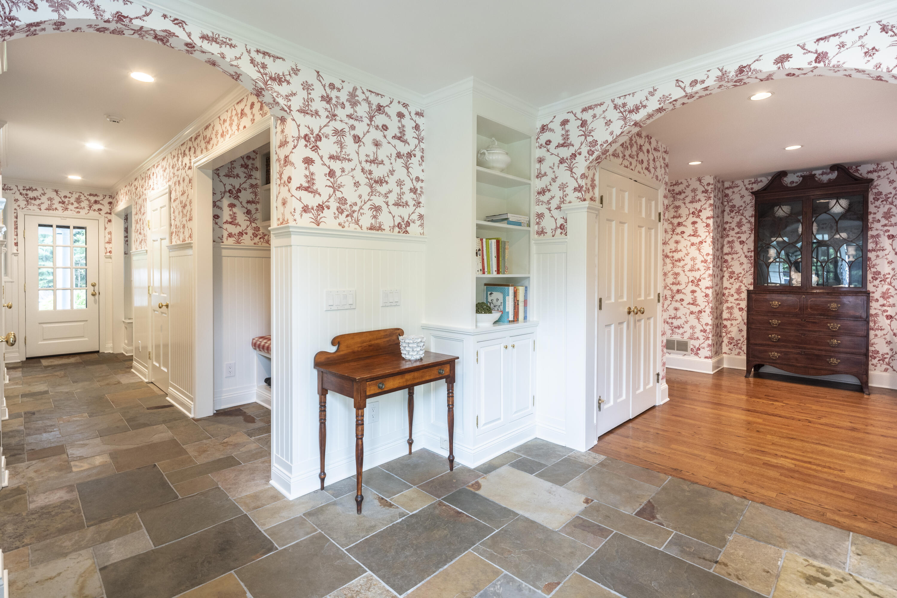 35 Rosebrook Road New Canaan, CT 06840 - Photo 18 of 38 a view of hallway with furniture and a chandelier