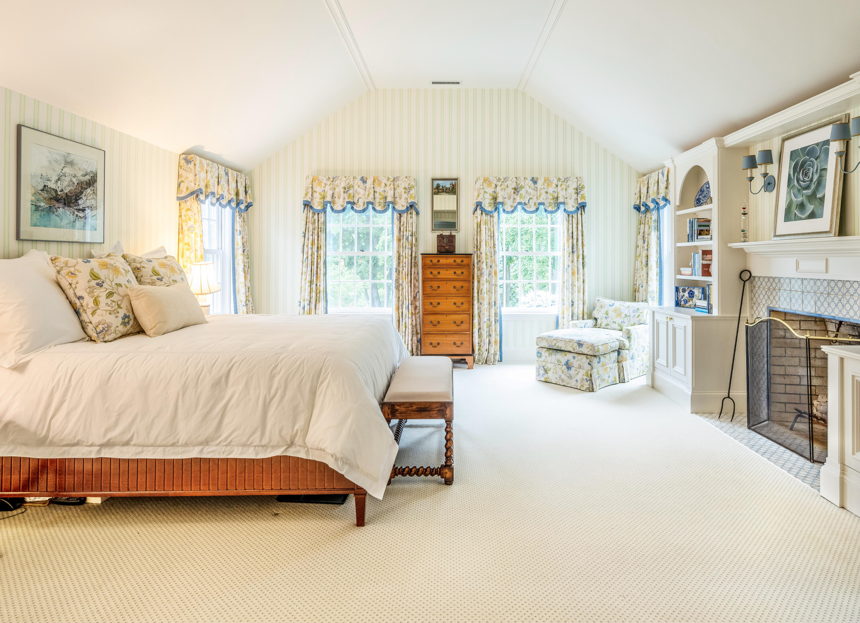 35 Rosebrook Road New Canaan, CT 06840 - Photo 23 of 38 a spacious bedroom with a bed lamp and a large window