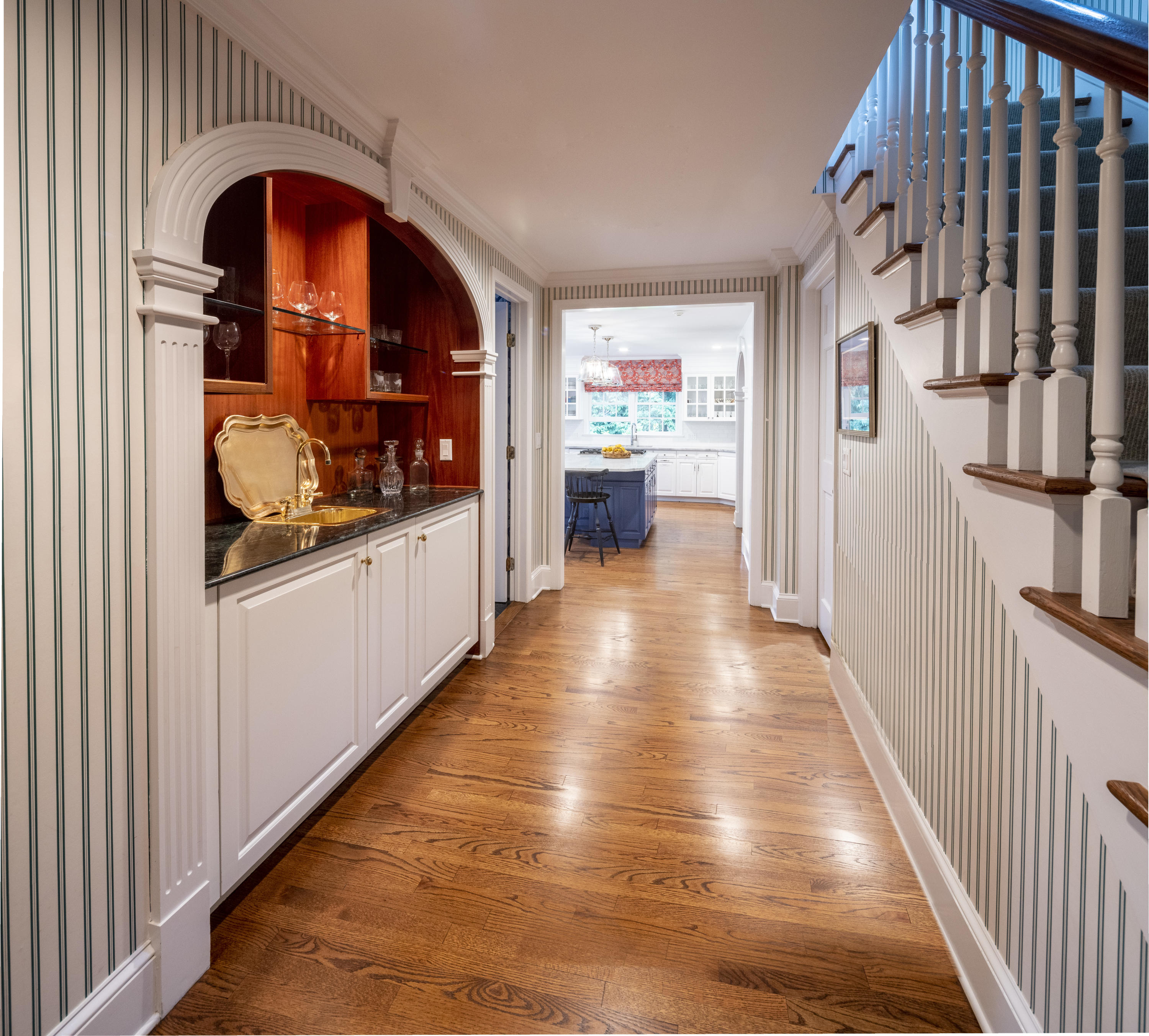 35 Rosebrook Road New Canaan, CT 06840 - Photo 10 of 38 a view of a hallway with wooden floor and staircase