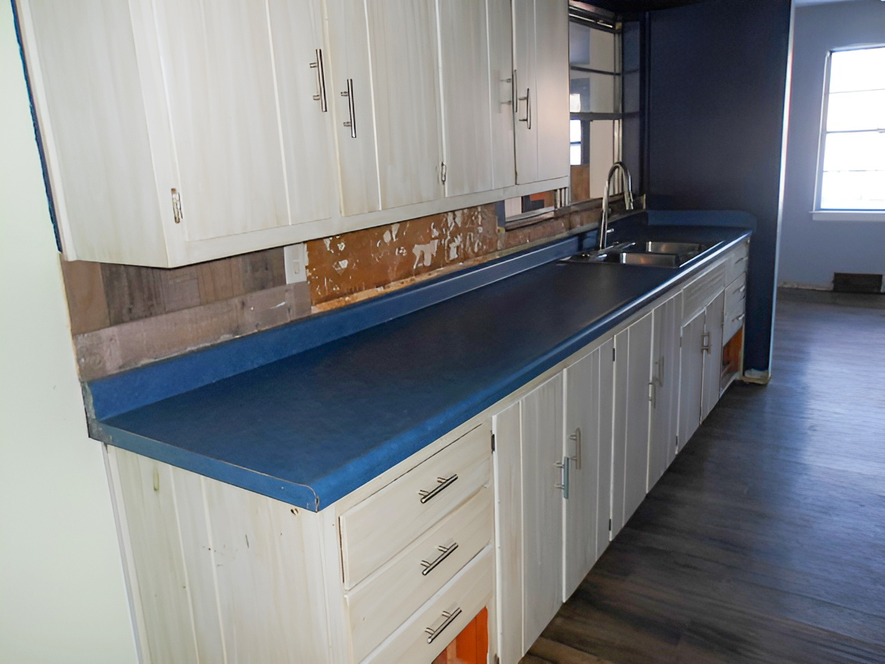 108 North Locust Street Maroa, IL 61756 - Photo 5 of 13 a kitchen with stainless steel appliances a sink dishwasher stove and cabinets