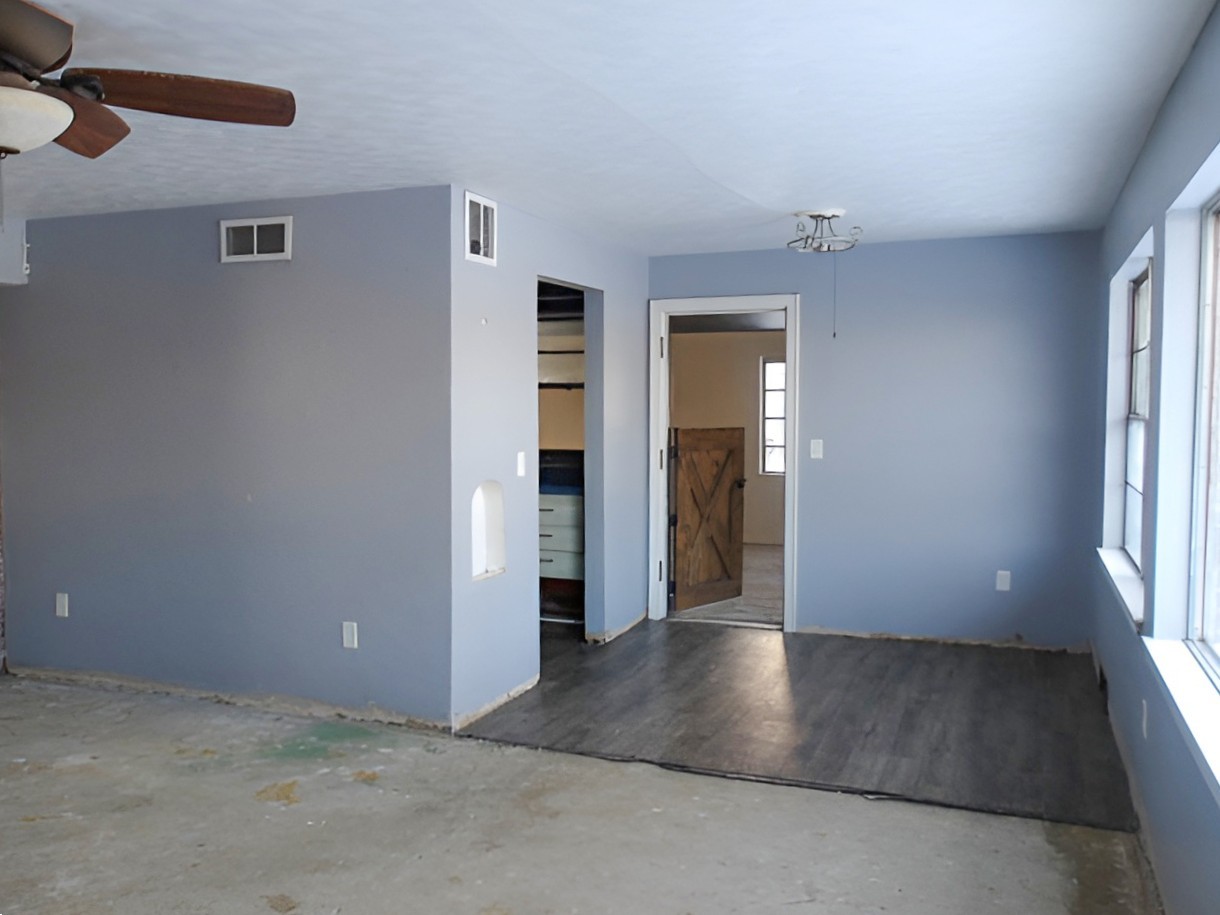 108 North Locust Street Maroa, IL 61756 - Photo 7 of 13 an empty room with windows and entrance