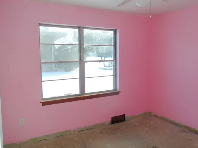 an empty room with a window