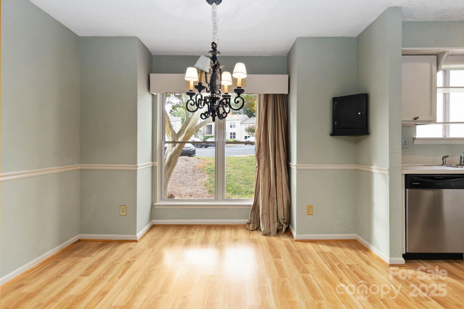 11001 Running Ridge Rd. Charlotte, NC 28226 - Photo 14 of 38 a view of an empty room with a window