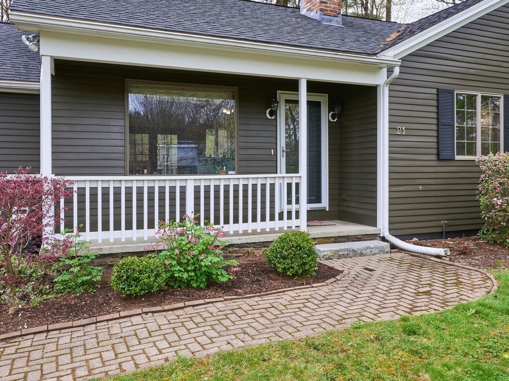21 Collette Road Sturbridge, MA 01518 - Photo 3 of 42 a view of a house with a small yard and wooden floor and fence