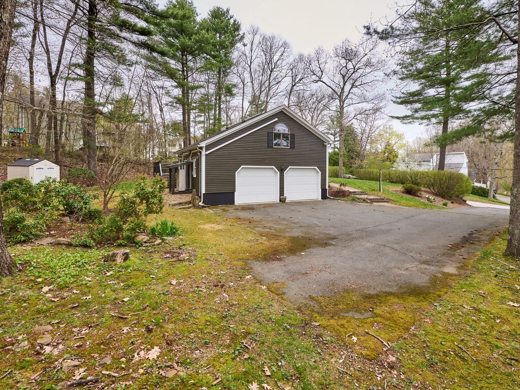 21 Collette Road Sturbridge, MA 01518 - Photo 38 of 42 a front view of a house with a yard