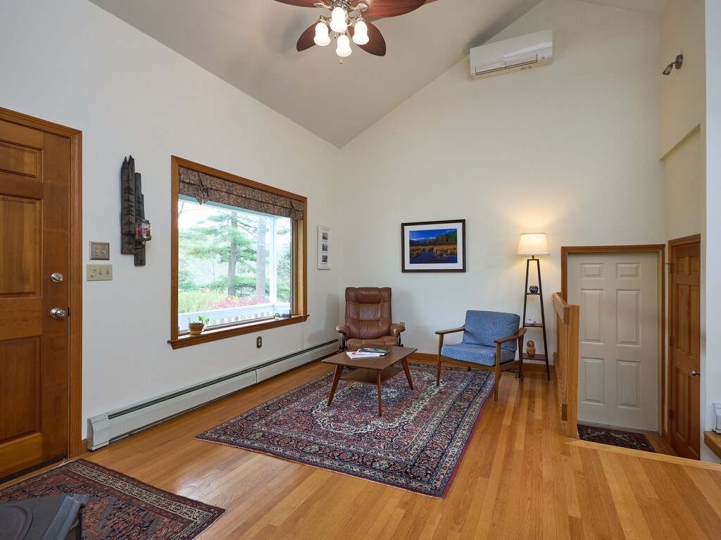 21 Collette Road Sturbridge, MA 01518 - Photo 5 of 42 a living room with furniture rug and a window