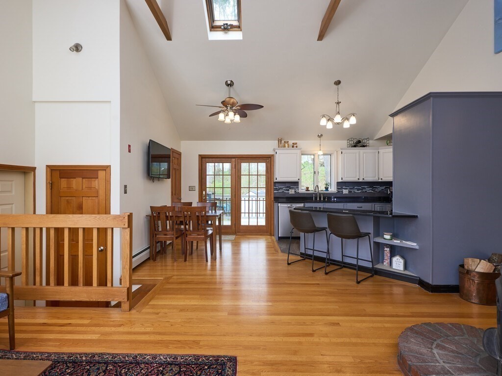 21 Collette Road Sturbridge, MA 01518 - Photo 6 of 42 a living room with fireplace furniture and a dining table