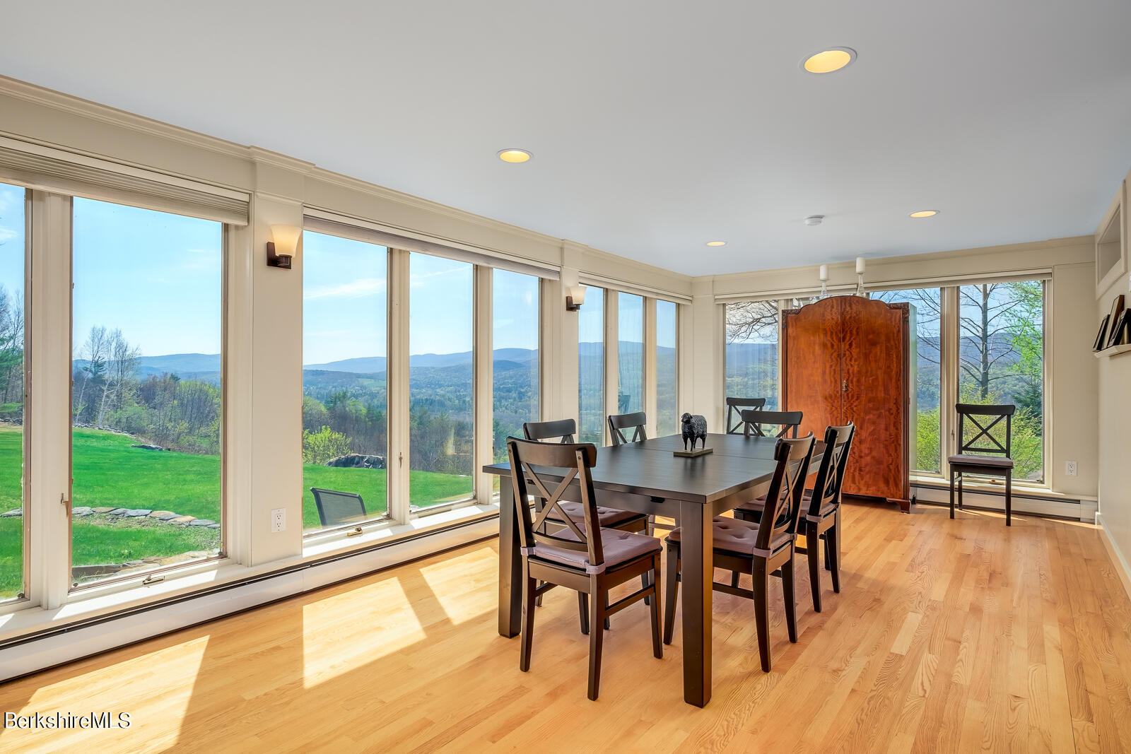 491 Henderson Road Williamstown, MA 01267 - Photo 14 of 42 a view of a dining room with furniture and wooden floor
