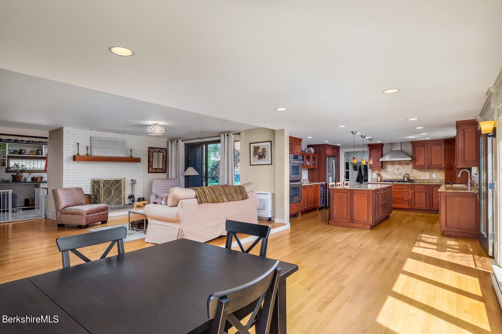 491 Henderson Road Williamstown, MA 01267 - Photo 15 of 42 a living room with lots of furniture and kitchen view