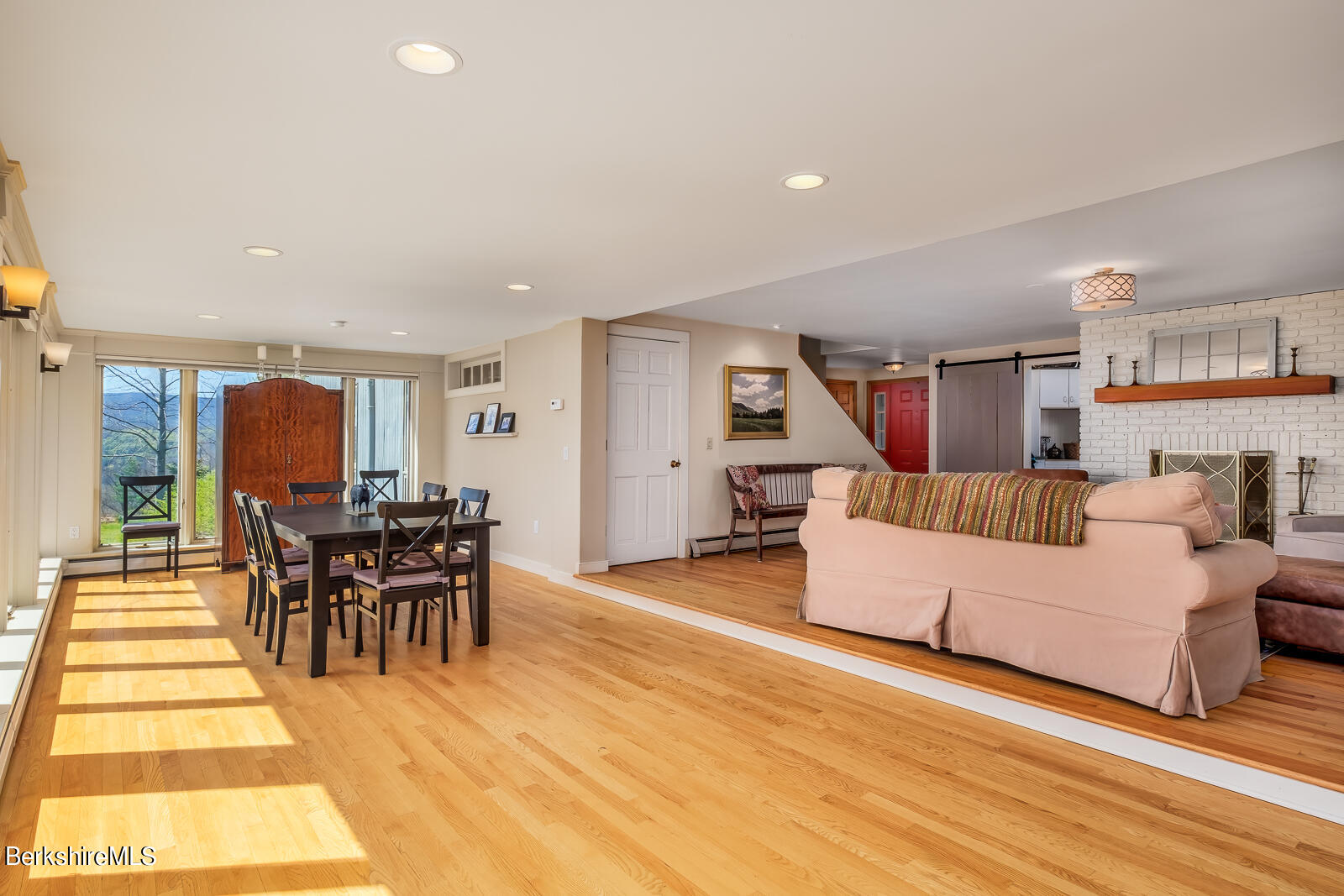 491 Henderson Road Williamstown, MA 01267 - Photo 16 of 42 a living room with furniture and a table
