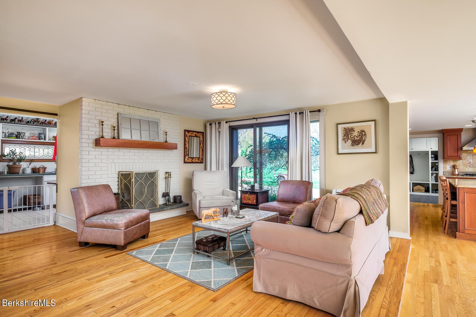 491 Henderson Road Williamstown, MA 01267 - Photo 17 of 42 a living room with furniture and a wooden floor
