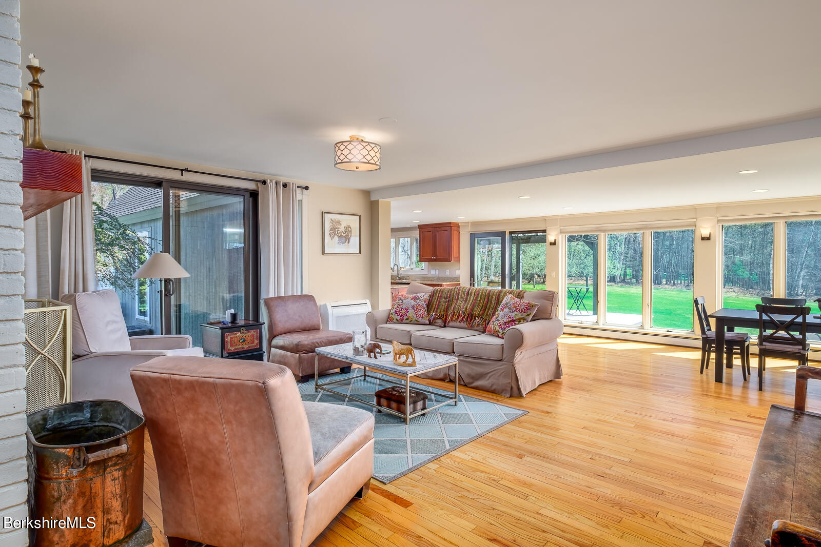 491 Henderson Road Williamstown, MA 01267 - Photo 18 of 42 a living room with furniture and a large window