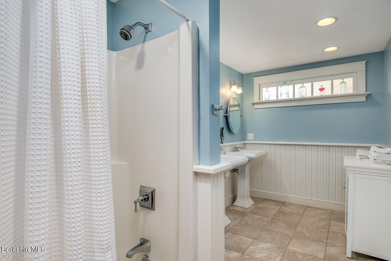491 Henderson Road Williamstown, MA 01267 - Photo 19 of 42 a bathroom with a sink a mirror and a shower