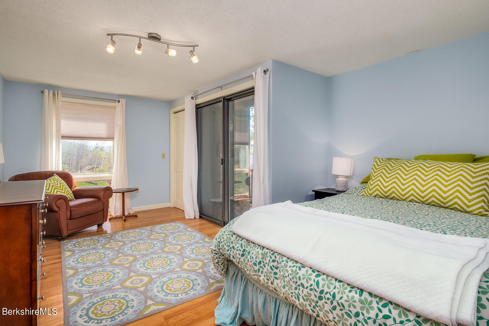 491 Henderson Road Williamstown, MA 01267 - Photo 21 of 42 a bedroom with a bed and a couch