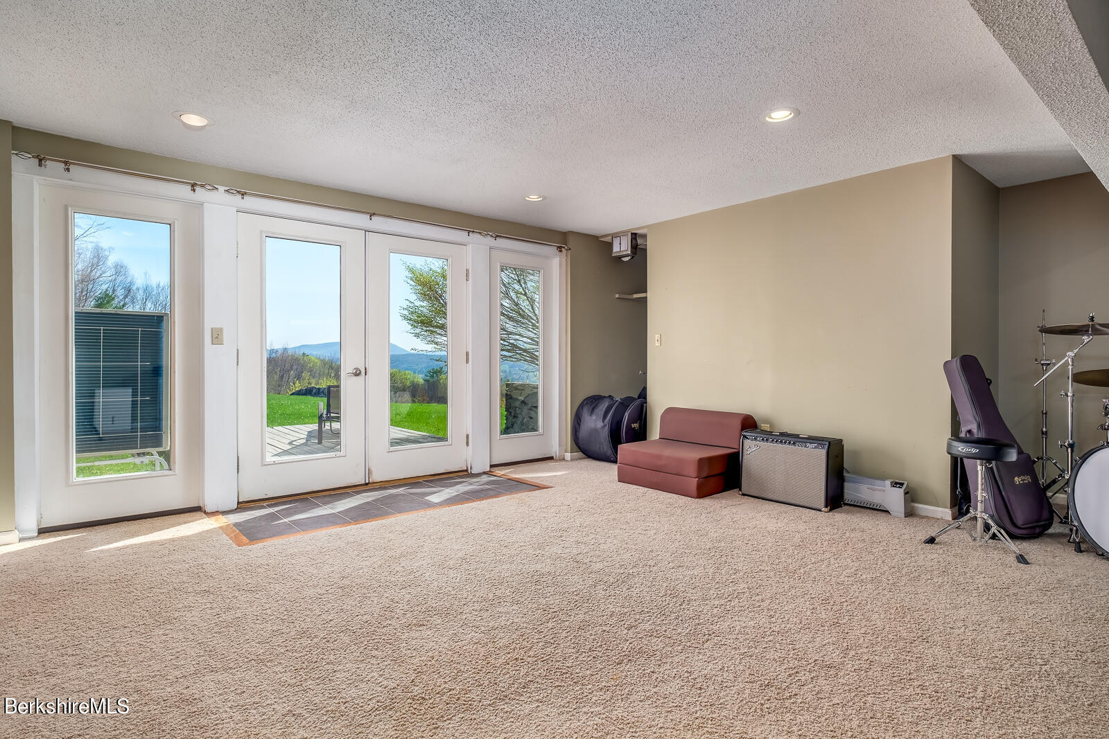 491 Henderson Road Williamstown, MA 01267 - Photo 33 of 42 a bedroom with furniture and a large window