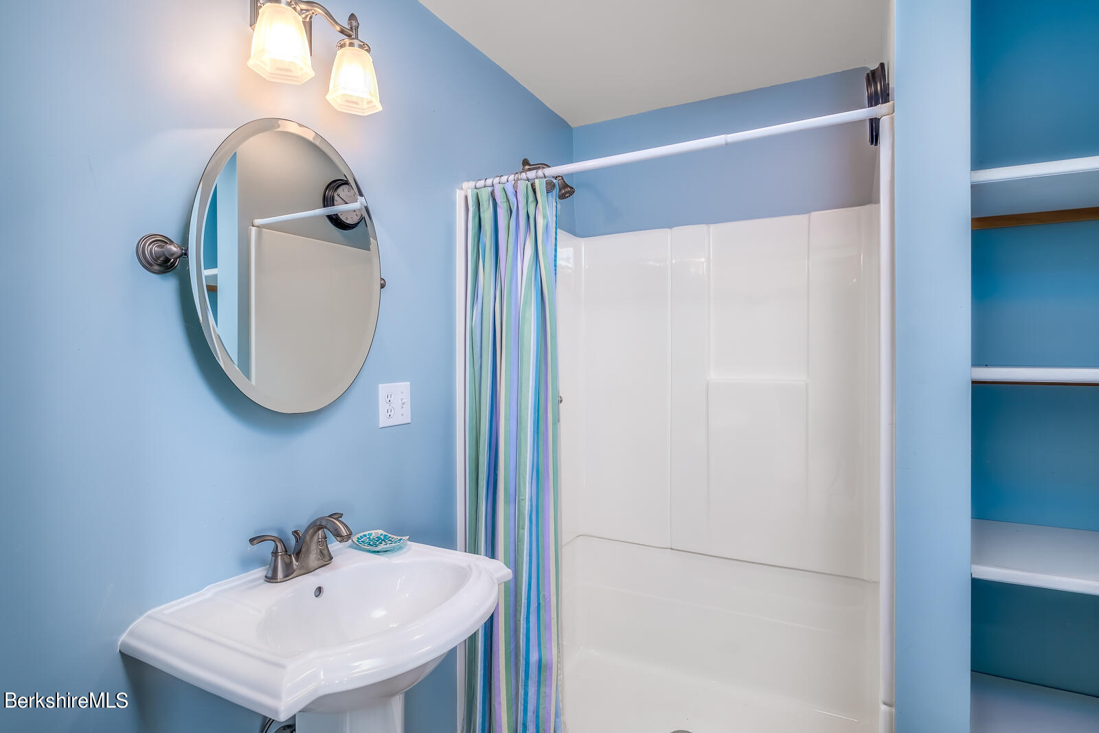 491 Henderson Road Williamstown, MA 01267 - Photo 35 of 42 a bathroom with a sink a mirror and a mirror