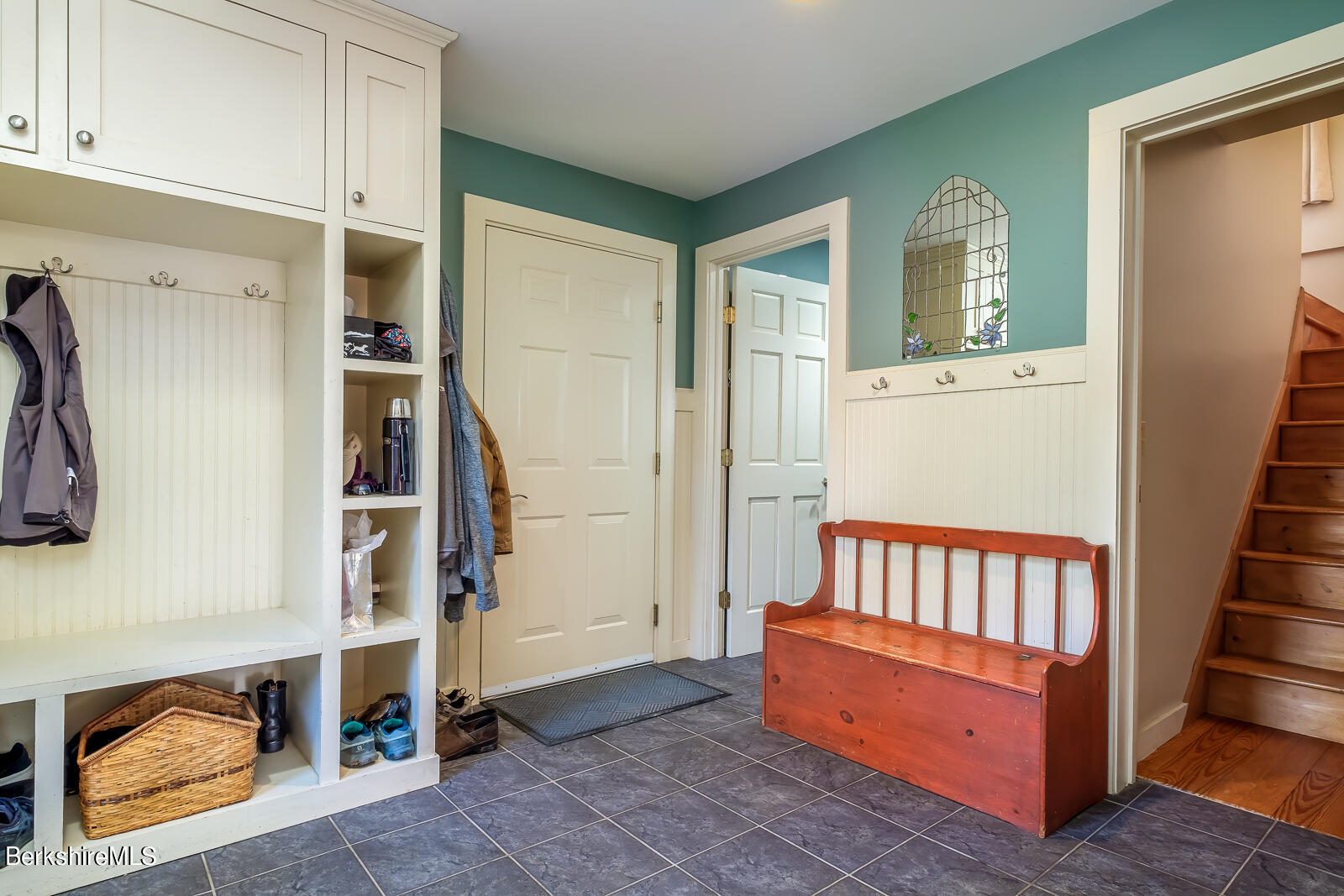 491 Henderson Road Williamstown, MA 01267 - Photo 38 of 42 a room with stairs and a rug