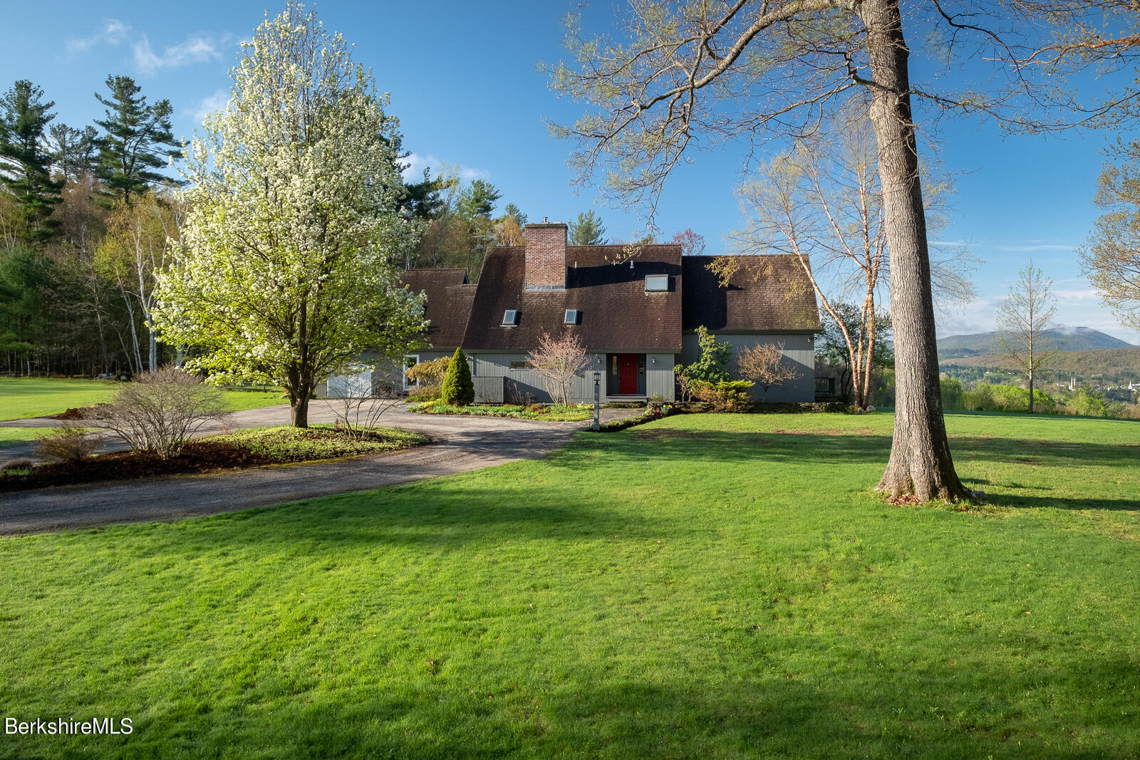 491 Henderson Road Williamstown, MA 01267 - Photo 7 of 42 a view of a park with swings and slides