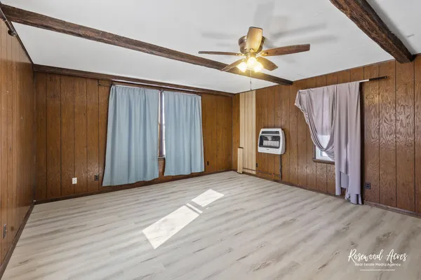 a view of an empty room and window