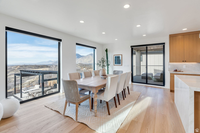 3918 South Mapleton Ests Drive Mapleton, UT 84664 - Photo 19 of 103 Dining space with light wood finished floors, a mountain view, and recessed lighting