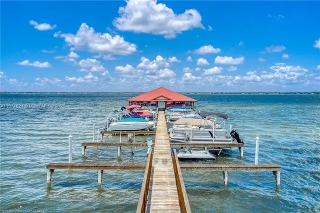 a view of a lake with sitting area