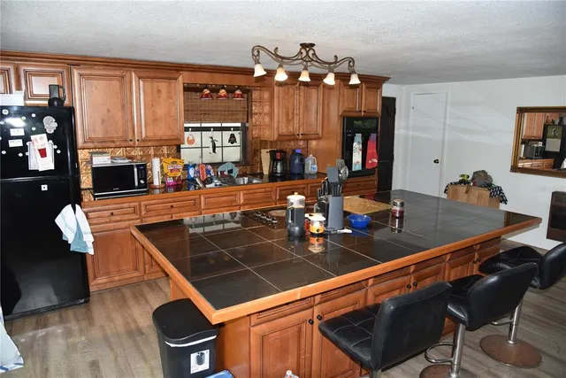 a view of balcony and kitchen