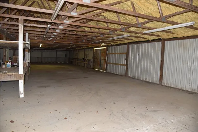 a view of a room with wooden racks