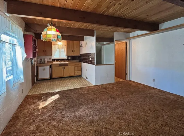 a view of entryway with wooden floor and stairs