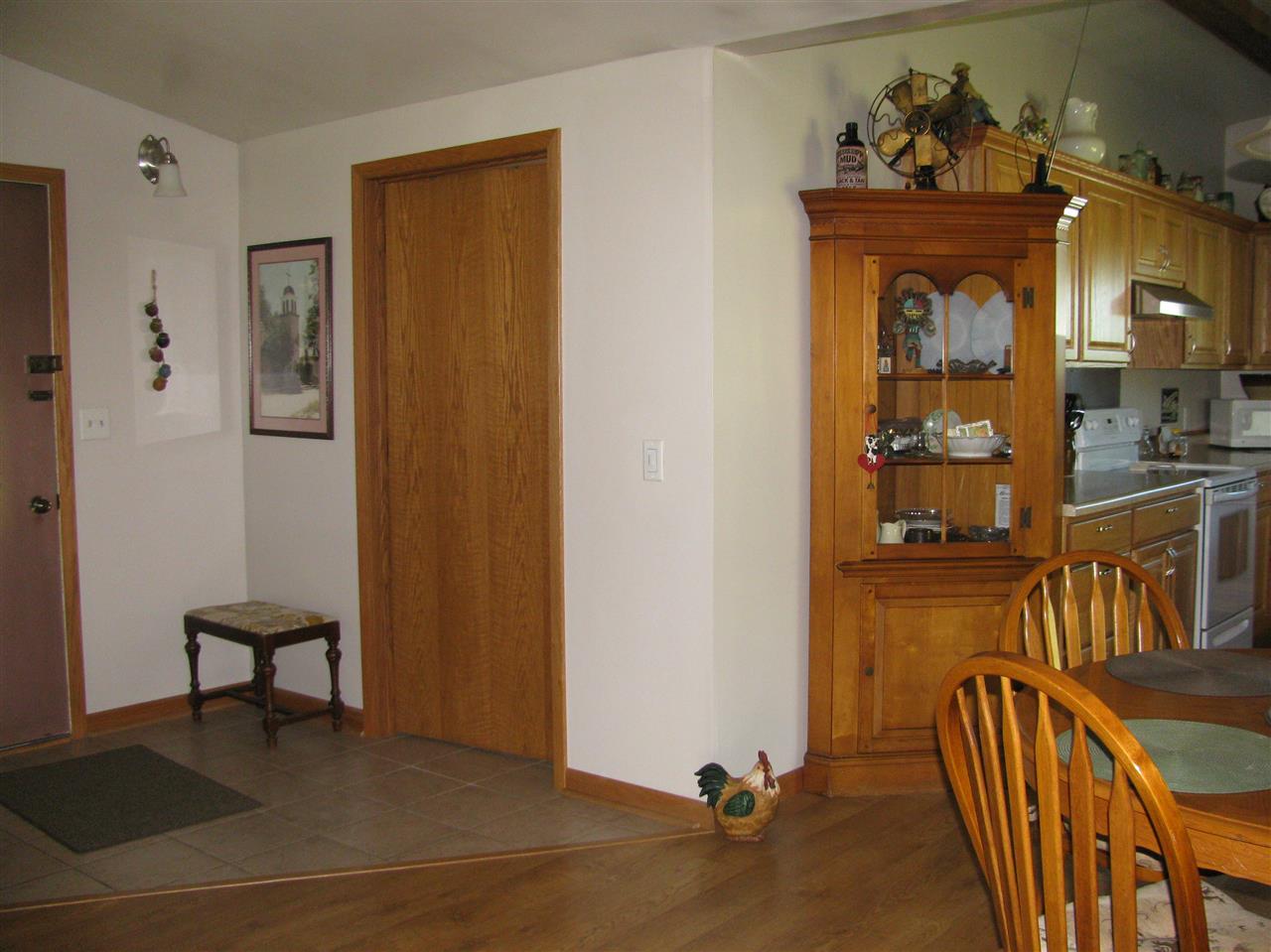 15533 Comly Rd. Pecatonica, IL 61063 - Photo 7 of 25 a view of livingroom with furniture and wooden floor