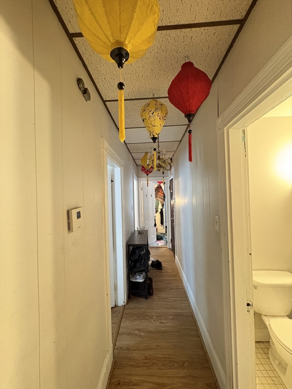 137 Centre Street, Unit 2 Boston, MA 02119 - Photo 8 of 8 a view of hallway and stairs