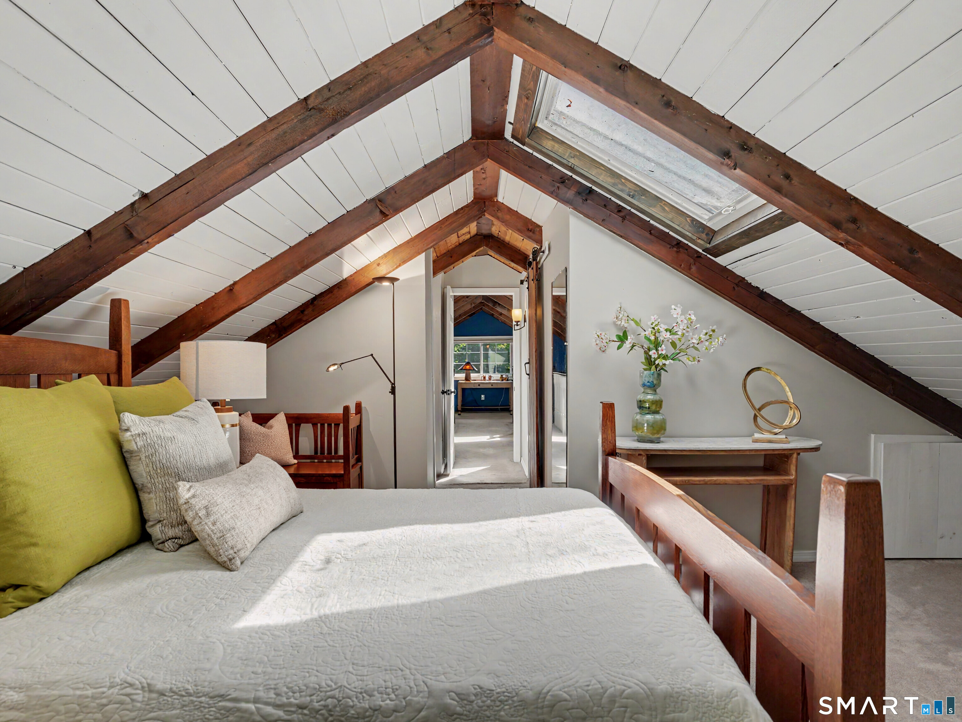 252 Bennetts Farm Road Ridgefield, CT 06877 - Photo 22 of 40 Cathedral Ceiling Primary Bedroom is filled with light. It has a walk-in closet for plenty of storage.