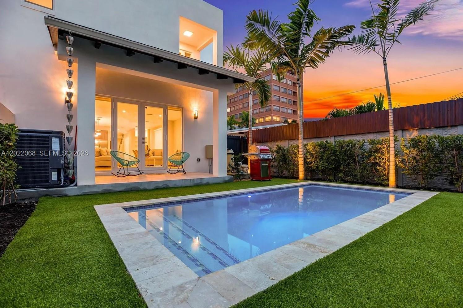 a view of an outdoor space and swimming pool