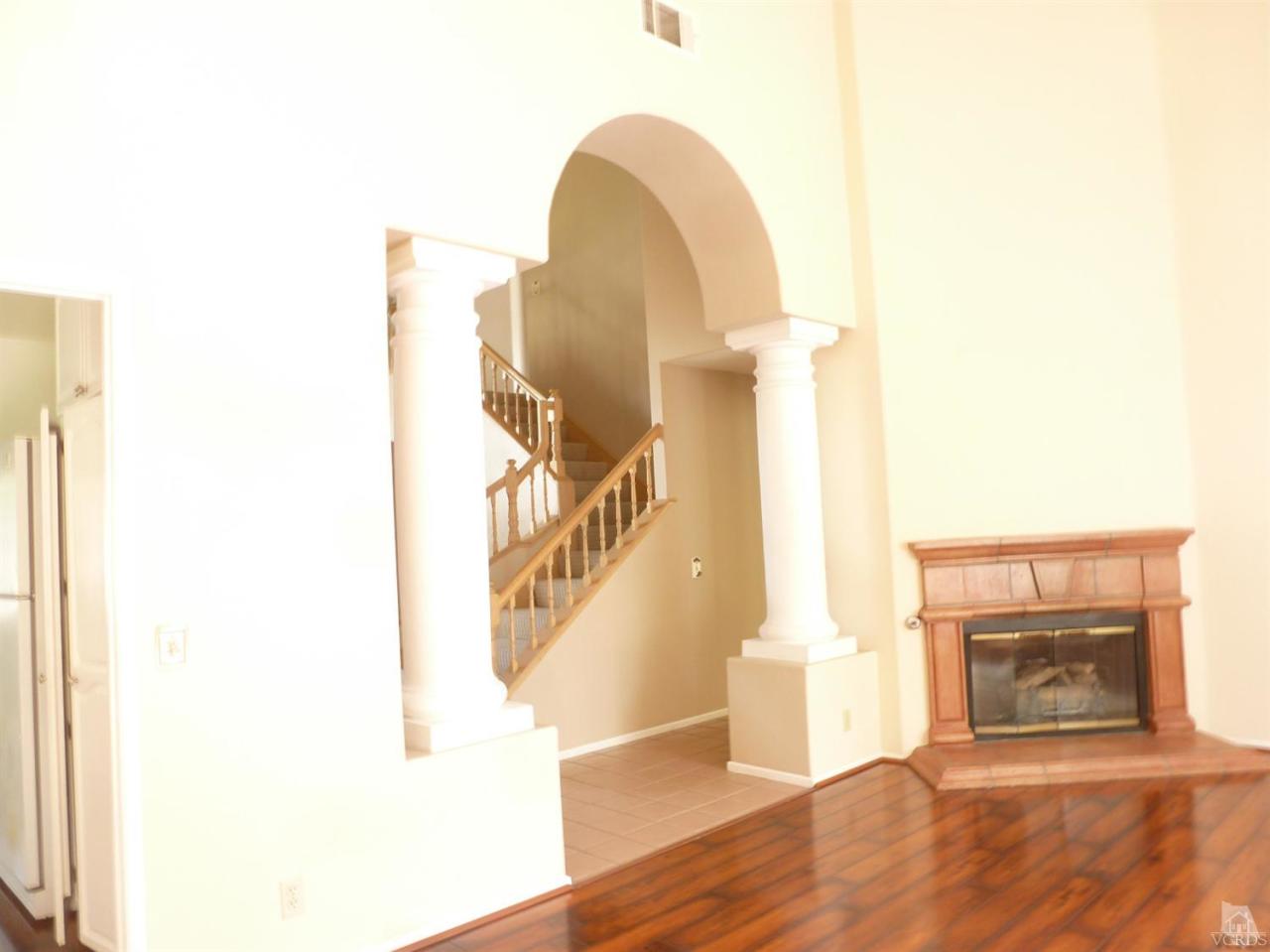 493 Innwood Road Simi Valley, CA 93065 - Photo 12 of 34 a view of a living room with a fireplace