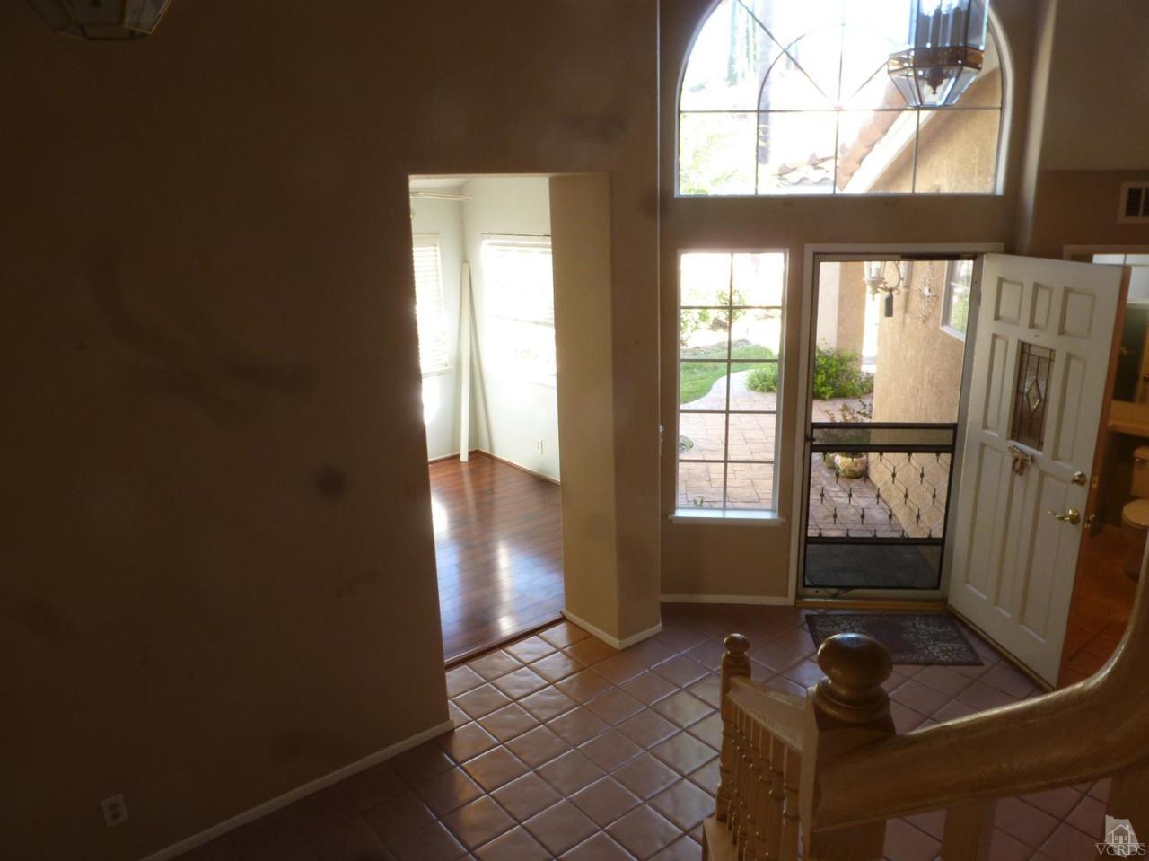493 Innwood Road Simi Valley, CA 93065 - Photo 21 of 34 a living room with furniture and a window