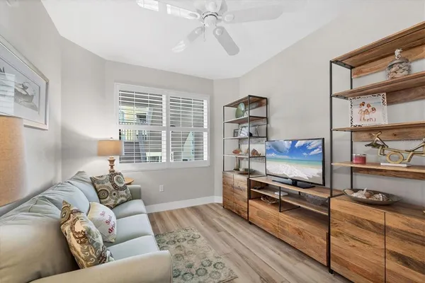 a living room with furniture and a window