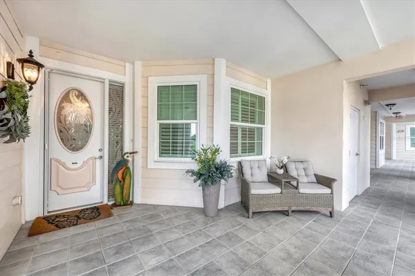 a living room with furniture and a window