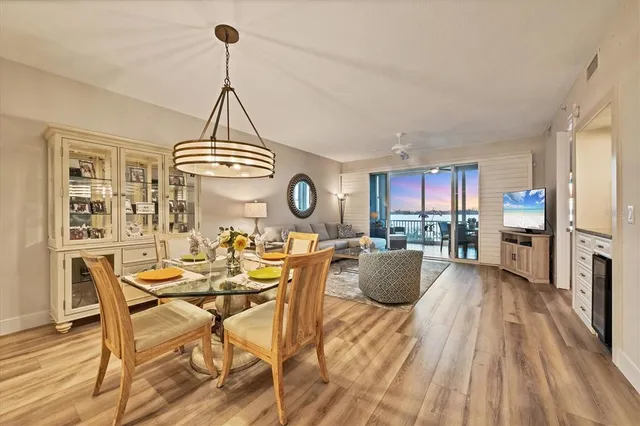 a living room with fireplace furniture and a window