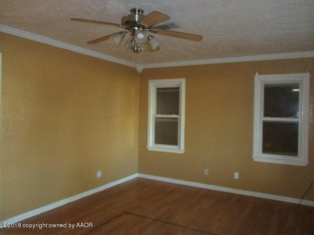 4124 South Lipscomb Street Amarillo, TX 79110 - Photo 13 of 18 a view of an empty room with a window