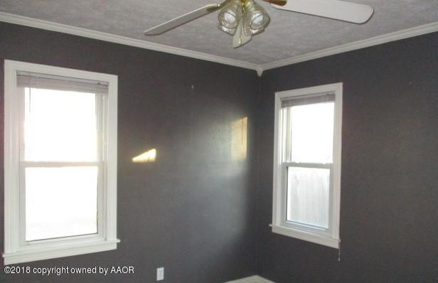 4124 South Lipscomb Street Amarillo, TX 79110 - Photo 7 of 18 a view of an empty room and window
