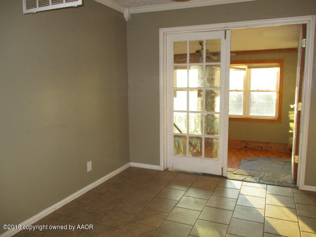 4124 South Lipscomb Street Amarillo, TX 79110 - Photo 10 of 18 a view of an empty room with a window