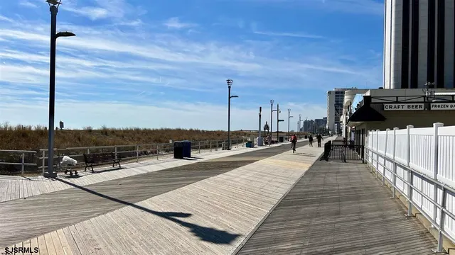 a view of a balcony with wooden floor