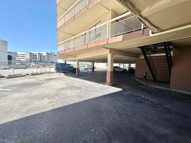 a view of a building with a garage