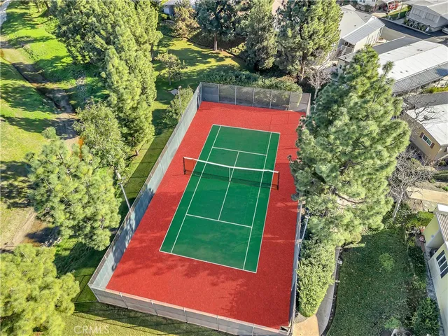 an aerial view of a swimming pool and mountain view