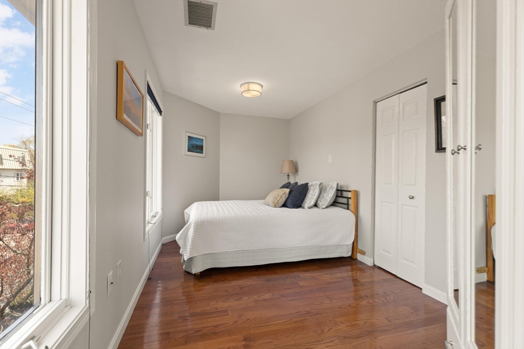 15 Flume Road, Unit 4 Gloucester, MA 01930 - Photo 21 of 41 a room with a bed and a window