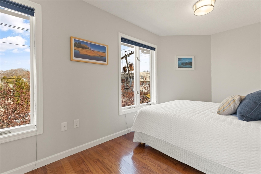 15 Flume Road, Unit 4 Gloucester, MA 01930 - Photo 22 of 41 a bedroom with a bed and a window